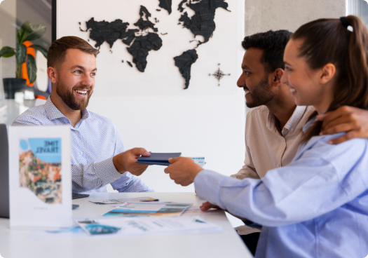 People at a table smiling